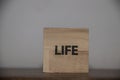 Love, good life, feel. Positive inspirational messages and words on wooden cubes