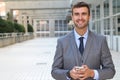 Good looking businessman isolated in office space