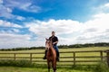 Handsome cowboy, horse rider on saddle, horseback adn boots Royalty Free Stock Photo