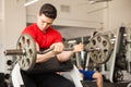 Good looking man working on his biceps Royalty Free Stock Photo