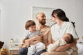 good looking parents holding their little Royalty Free Stock Photo