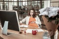 Good-looking pregnant woman feeling uncomfortable with her state Royalty Free Stock Photo