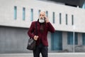 Senior man coming back from job, talking on phone Royalty Free Stock Photo