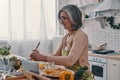 Good looking senior woman in apron