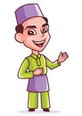 Good looking smiling young muslim man with songkok Malay costume presenting and pointing something