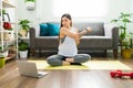 Hispanic woman doing warm up and stretching exercises Royalty Free Stock Photo