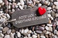 Good luck and everything is possible: greeting card with red heart for courage and convalescence. Royalty Free Stock Photo