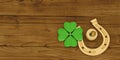 Good luck horseshoe clover ladybug on wooden board 3D illustration.