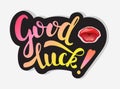 Good Luck inscription and lips for kiss. Colorful handwritten text with Black black outline on grey background. For