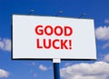 Good luck symbol. Concept words Good luck on beautiful big white billboard. Beautiful blue sky cloud background. Business, Royalty Free Stock Photo