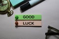 Good Luck text on sticky notes on office desk