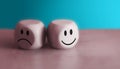 Good mental health and bad mood concept. Smiley face on the bright side and a sad face on the dark side on the wooden block cube Royalty Free Stock Photo