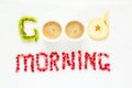 Good morning concept. `Good morning` words laid out with pieces of fruit and pomegranate seeds. Royalty Free Stock Photo