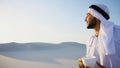 Good morning for male sheikh in middle of huge desert over cup o Royalty Free Stock Photo