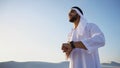 Good morning for male sheikh in middle of huge desert over cup o Royalty Free Stock Photo