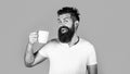 Good morning, man tea, ok. Smiling hipster man with cup of fresh coffee. Black and white Royalty Free Stock Photo