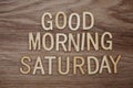 Good Morning Saturday text message on wooden background Royalty Free Stock Photo