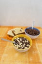 Bole of cereals and a plate with sweet bread Royalty Free Stock Photo