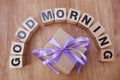 Good morning wooden letter alphabet on wooden background