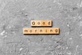 Good morning word written on wood block. good morning text on table, concept