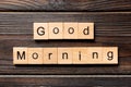 Good morning word written on wood block. good morning text on table, concept