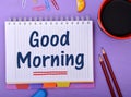 Good Morning wrriten on notepad with coffee cup Royalty Free Stock Photo