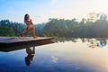 Good morning with yoga meditating on sunrise background Royalty Free Stock Photo