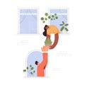 Good neighborhood concept. Neighbors help, woman sharing potted house plant, giving to man from open window. Neighbours Royalty Free Stock Photo