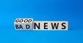 Good news and Bad news symbol. Turned wooden cubes with words Good news and Bad news. Beautiful blue background. Business concept Royalty Free Stock Photo