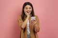 Good News. Happy Excited Teen Girl Reading Message On Smartphone Royalty Free Stock Photo