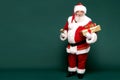 Good old Santa Claus holding gift boxes Royalty Free Stock Photo