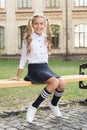 Good Outfit. small happy girl ready to study. schoolgirl in classy retro uniform. old school. back to school. childhood Royalty Free Stock Photo