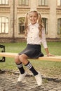 Good Outfit. small happy girl ready to study. schoolgirl in classy retro uniform. old school. back to school. childhood