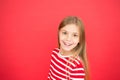 Good parenting. Child care. family and love. childrens day. happy little girl on red background. small girl child Royalty Free Stock Photo