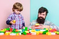Good parenting concept. small boy with dad playing together. father and son play game. happy family leisure. love. child Royalty Free Stock Photo