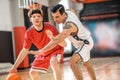 Two young men playing basketball and looking excited Royalty Free Stock Photo