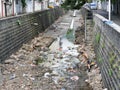 Good Samaritan Responsible Citizen Man clearing drains on Port-Louis Mauritius