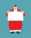 Good Santa Claus holding blank sign with space for text. Royalty Free Stock Photo