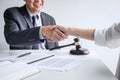 Good service cooperation of Consultation between a male lawyer and business woman customer, Handshake after good deal agreement, Royalty Free Stock Photo