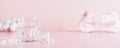 Good sleep concept, sleeping pills, glass of water and sleep mask on pink web banner Royalty Free Stock Photo