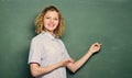 Good teacher is master of simplification. Woman teacher in front of chalkboard. Teacher explain hard topic. Passionate Royalty Free Stock Photo