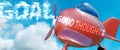 Good thoughts helps achieve a goal - pictured as word Good thoughts in clouds, to symbolize that Good thoughts can help achieving