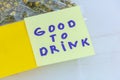 Good to drink handwritten message on sticky note about chamomile tea Royalty Free Stock Photo