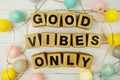 Good Vibes Only alphabet letters with LED cotton balls decoration on wooden background Royalty Free Stock Photo