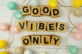 Good Vibes Only alphabet letters with LED cotton balls decoration on wooden background Royalty Free Stock Photo