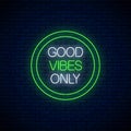 Good vibes only - glowing neon inscription phrase in green circle frame. Motivation quote in neon style