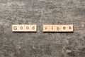 good vibes word written on wood block. good vibes text on table, concept Royalty Free Stock Photo