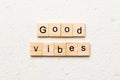 good vibes word written on wood block. good vibes text on table, concept Royalty Free Stock Photo