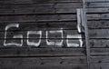 The word `good` written in chalk on wooden boards Royalty Free Stock Photo