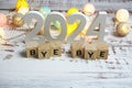 Goodbye 2024 alphabet letters with space copy on wooden background